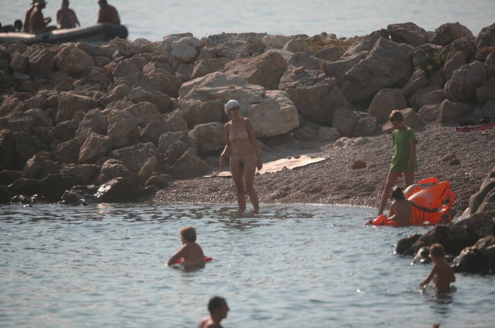 FKK cove pyramid in waters - The natural beauty of the body is revealed in nudism