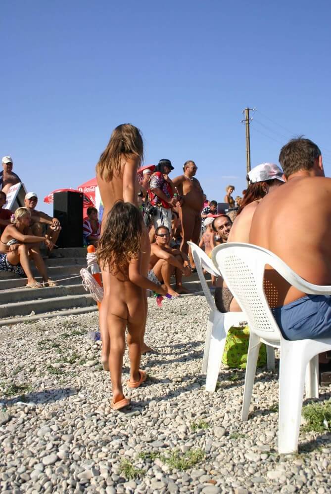 Naturist Standing Sideline - Nature and nudism are the best home for a person
