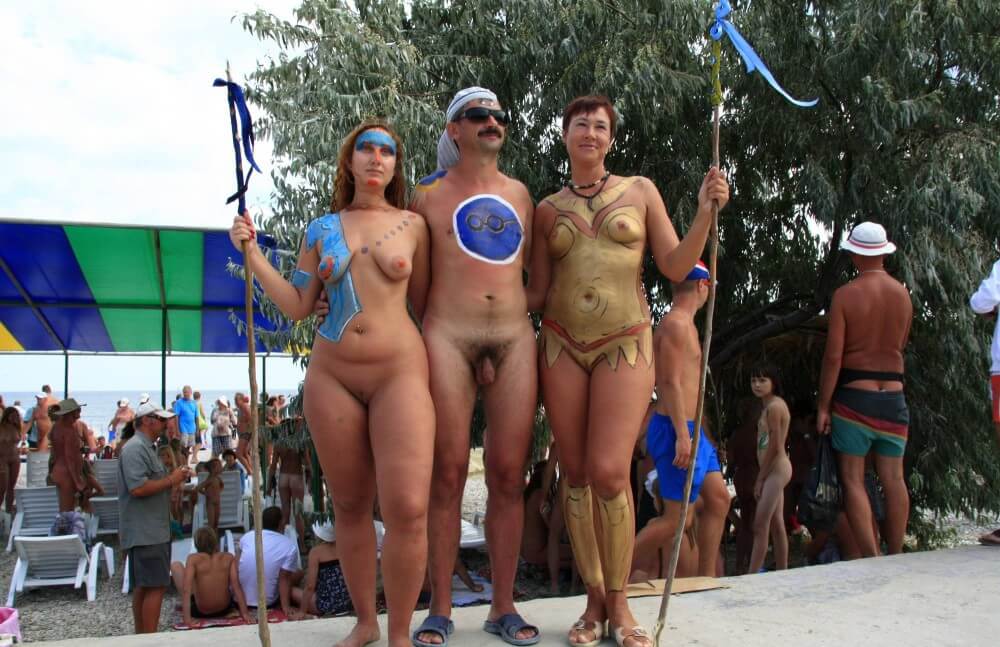 Three Painted Girl Poses pics - She appeared completely naked