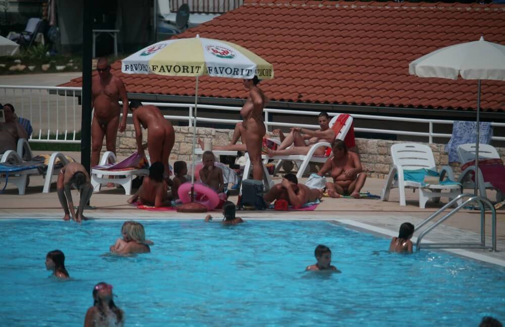 Naturist Pool Observation pics - Harmony and balance are important in this nudist culture