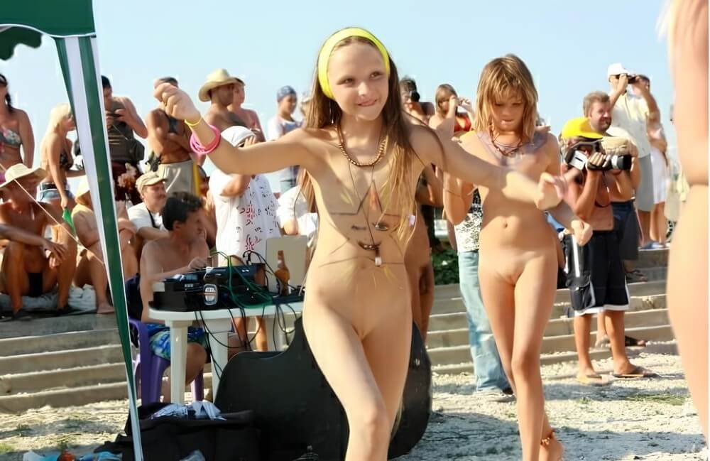Nudist beauty contest photos - Spectators are permitted to be naked