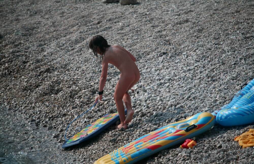 Naturist Surf Board Glides pics - Naturists live easily and freely