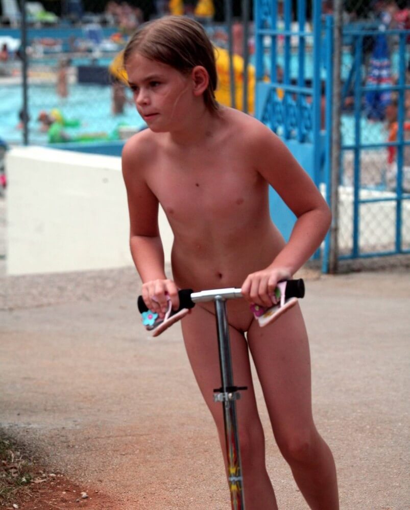 Pool-Side Naturist Scooter pics - The Naked Human Body