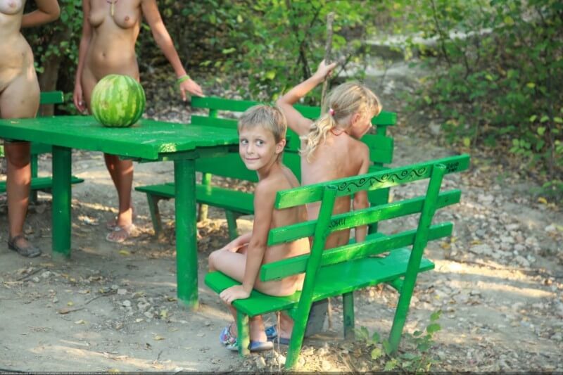Naturists green picnic photos - People practice nudism to achieve harmony with nature
