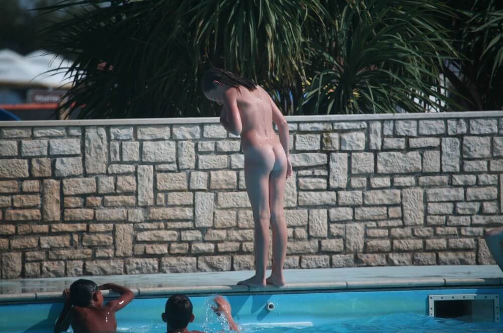 Naturist Pool-Side Singles pics - Nudity helps one feel a sense of freedom and liberation