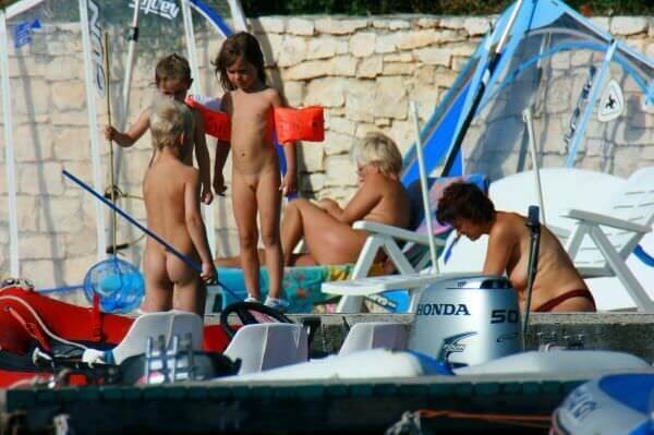 By the boat photos - Support and mutual understanding are important in the nudism movement
